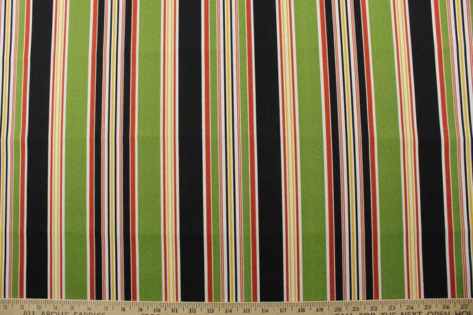  Introducing Richloom© Solarium© Outdoor Easybay in Noir. Perfect for porches and patios, this fabric features multi-width stripes in green, black, yellow, red, and white. It's also stain and water repellant and offers 500 UV hours for long-lasting use.  Perfect for lounge cushions, pool furniture, tablecloths, decorative pillows and upholstery projects. <span data-mce-fragment=