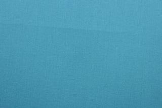 Covington© Pebbletex Poplin Weave Fabric in 219 Turquoise