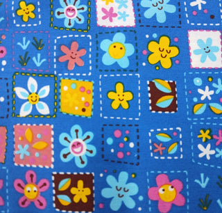 Emma & Mila Happy Faces Broadcloth Fabric in Blue