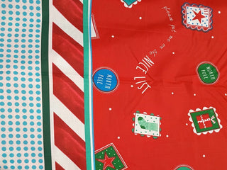 Baum Textiles Santa's List Stamps Quilting Fabric in Red
