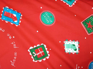 Baum Textiles Santa's List Stamps Quilting Fabric in Red