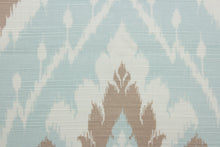 Load image into Gallery viewer, Lima is a multi-use fabric that blends cotton, linen and rayon for a luxurious and soft feel.  Its classic damask print comes in surf blue, tan and cream and has a durability of 15,000 double rubs.  The versatile fabric is perfect for window accents (draperies, valances, curtains and swags) cornice boards, accent pillows, bedding, headboards, cushions, ottomans, slipcovers and light duty upholstery.  
