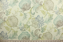 Load image into Gallery viewer,  Calypso is a beautiful patterned print with detailed floral vines set against a striking ivory background. It features a range of colors, including brown, blue, and green, creating an elegant, timeless look.  The versatile fabric is perfect for window accents (draperies, valances, curtains and swags) cornice boards, accent pillows, bedding, headboards, cushions, ottomans, slipcovers and light duty upholstery.  
