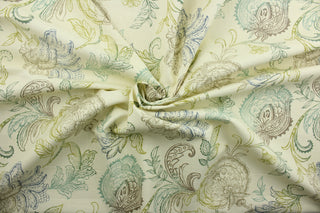  Calypso is a beautiful patterned print with detailed floral vines set against a striking ivory background. It features a range of colors, including brown, blue, and green, creating an elegant, timeless look.  The versatile fabric is perfect for window accents (draperies, valances, curtains and swags) cornice boards, accent pillows, bedding, headboards, cushions, ottomans, slipcovers and light duty upholstery.  