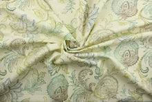 Load image into Gallery viewer,  Calypso is a beautiful patterned print with detailed floral vines set against a striking ivory background. It features a range of colors, including brown, blue, and green, creating an elegant, timeless look.  The versatile fabric is perfect for window accents (draperies, valances, curtains and swags) cornice boards, accent pillows, bedding, headboards, cushions, ottomans, slipcovers and light duty upholstery.  

