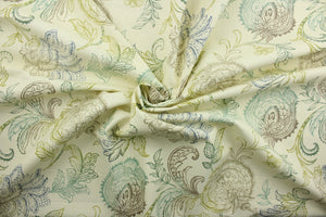  Calypso is a beautiful patterned print with detailed floral vines set against a striking ivory background. It features a range of colors, including brown, blue, and green, creating an elegant, timeless look.  The versatile fabric is perfect for window accents (draperies, valances, curtains and swags) cornice boards, accent pillows, bedding, headboards, cushions, ottomans, slipcovers and light duty upholstery.  