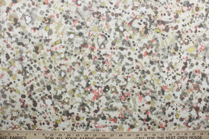 Drip Style is perfect for adding a splash of color to any room. It features a splatter design in shades of grey, pink, white, yellow, and taupe. The versatile fabric is perfect for window accents (draperies, valances, curtains and swags) cornice boards, accent pillows, bedding, headboards, cushions, ottomans, slipcovers and upholstery.  