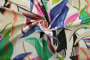 Conga features a large-scale botanical print in green, pink, orange, blue, brown and tan.  Its soil and stain repellant finish ensures long-lasting quality and easy maintenance.  The versatile fabric is perfect for window accents (draperies, valances, curtains and swags) cornice boards, accent pillows, bedding, headboards, cushions, ottomans, slipcovers and upholstery.  