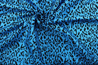 Our Leopard in Blue fabric offers a unique combination of style and comfort. The bold leopard print is textured and soft, making it ideal for drapery and apparel. Add a touch of style to your home décor or wardrobe with this stylish fabric.