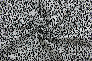 Our Leopard in Gray fabric offers a unique combination of style and comfort. The bold leopard print is textured and soft, making it ideal for drapery and apparel. Add a touch of style to your home décor or wardrobe with this stylish fabric.