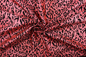 Our Leopard in Peach fabric offers a unique combination of style and comfort. The bold leopard print is textured and soft, making it ideal for drapery and apparel. Add a touch of style to your home décor or wardrobe with this stylish fabric.