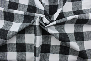 This Solarium outdoor decorative print features a plaid design in black and white.  This versatile, long-lasting fabric can withstand up to 500 hours of sunlight, water and stain resistant and has 15,000 double rubs.  It is perfect for lounge cushions, pool furniture, tablecloths, decorative pillows and upholstery projects.  This fabric has a slightly stiff feel but is easy to work with.  