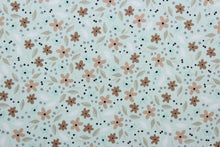 Load image into Gallery viewer, Cicely features an intricate floral pattern in shades of brown, tan, white, and black, set against a light green background.  The high-quality cotton material ensures lasting durability and softness.  It would be great for apparel, quilting, crafting and sewing projects.  
