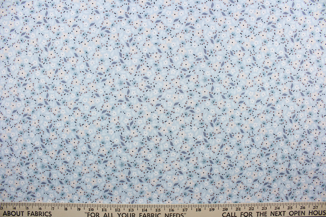  Cicely features an intricate floral pattern in shades of light pink, slate blue, white, and black set against a light blue background.  The high-quality cotton material ensures lasting durability and softness.  It would be great for apparel, quilting, crafting and sewing projects.  