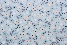 Load image into Gallery viewer,  Cicely features an intricate floral pattern in shades of light pink, slate blue, white, and black set against a light blue background.  The high-quality cotton material ensures lasting durability and softness.  It would be great for apparel, quilting, crafting and sewing projects.  

