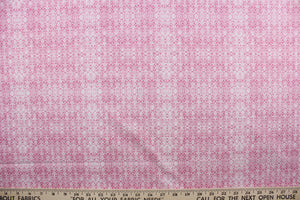 Sweetness features a timeless damask pattern in pink and white.  Perfect for any living space, it is sure to bring a splash of joy to your home. The high-quality cotton material ensures lasting durability and softness.  It would be great for apparel, quilting, crafting and sewing projects.  