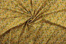 Load image into Gallery viewer, Flora features an intricately-detailed floral print comprised of pink, yellow, blue, green, and white on a cheerful marigold yellow background. This timeless design is perfect for adding a pop of color to any room.  The high-quality cotton material ensures lasting durability and softness, making it perfect for your next quilting or stitching project.  The versatile lightweight fabric is soft and easy to sew.  It would be great for apparel, quilting, crafting and sewing projects.  
