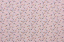 Load image into Gallery viewer, Dotty is a vibrant quilted fabric featuring pink, light blue, black, brown, and tan polka dots against a blush-colored background. The high-quality cotton material ensures lasting durability and softness, making it perfect for your next quilting or stitching project.  The versatile lightweight fabric is soft and easy to sew.  It would be great for apparel, quilting, crafting and sewing projects.  
