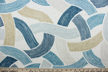 Load image into Gallery viewer, Ryman is the perfect choice for any space. Its multi purpose design features an abstract pattern with shades of blue, beige, tan on a ivory background.  It can be used for several different statement projects including window accents (drapery, curtains and swags), decorative pillows, hand bags, bed skirts, duvet covers, upholstery and craft projects.  It has a soft workable feel yet is stable and durable.
