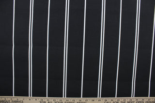 This outdoor fabric features white stripes set against a black background. It has a slightly stiff feel but easy to work with.  Solarium fabric will withstand up to 500 hours of sunlight, resists stains, water resistant and has a rating of 10,000 double rubs.  Perfect for porches, patios, and poolside.  Uses include toss pillows, cushions, upholstery, tote bags and more.