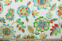 Load image into Gallery viewer, This printed indoor/outdoor fabric featuring a floral design is perfect for any project where the fabric will be exposed to the weather.  It is fade resistant and UV tested and can withstand up to 500 hours of direct sunlight.  It is also stain and water repellant and has a resistance to dirt and mildew.  Uses include cushions, tablecloths, upholstery projects, decorative pillows and craft projects.
