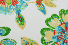 Load image into Gallery viewer, This printed indoor/outdoor fabric featuring a floral design is perfect for any project where the fabric will be exposed to the weather.  It is fade resistant and UV tested and can withstand up to 500 hours of direct sunlight.  It is also stain and water repellant and has a resistance to dirt and mildew.  Uses include cushions, tablecloths, upholstery projects, decorative pillows and craft projects.
