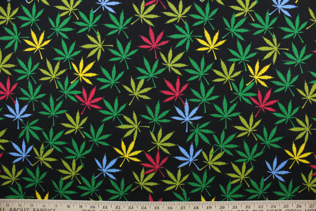  Reefer in Rainbow offers a vibrant twist on traditional marijuana leaves.  This special fabric features a vibrant array of colors, including shades of green, red, blue, and yellow against a black background.  The high-quality cotton material ensures lasting durability and softness.  It would be great for apparel, quilting, crafting and sewing projects.  