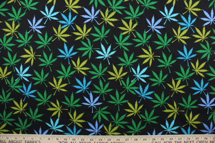 Herbal in Mix is a unique, four-color pattern featuring marijuana leaves over a black background. The vivid colors of turquoise, sky blue and green are sure to stand out.  The high-quality cotton material ensures lasting durability and softness.  It would be great for apparel, quilting, crafting and sewing projects.  