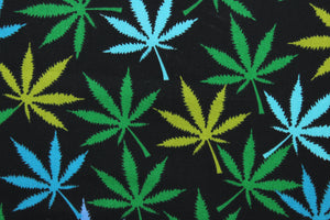Herbal in Mix is a unique, four-color pattern featuring marijuana leaves over a black background. The vivid colors of turquoise, sky blue and green are sure to stand out.  The high-quality cotton material ensures lasting durability and softness.  It would be great for apparel, quilting, crafting and sewing projects.  