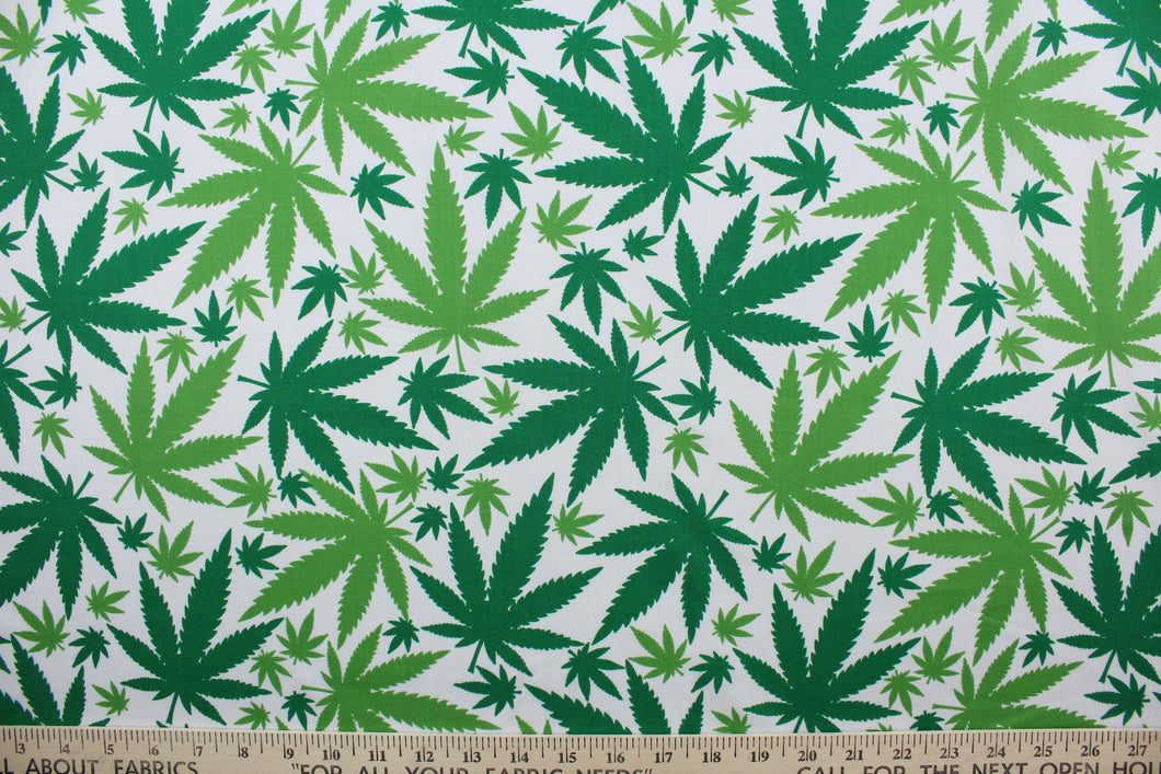  Ganja in Green is perfect for any cannabis enthusiast.  Featuring various sized marijuana leaves in a classic green against a white background, this design packs plenty of personality.  The high-quality cotton material ensures lasting durability and softness.  It would be great for apparel, quilting, crafting and sewing projects.  