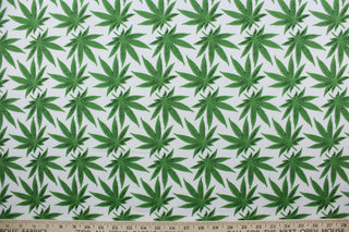 Weedy in White features green marijuana leaves against a white background.  This fashionable design is perfect for expressing yourself in a subtle and stylish way.  The high-quality cotton material ensures lasting durability and softness.  It would be great for apparel, quilting, crafting and sewing projects.  