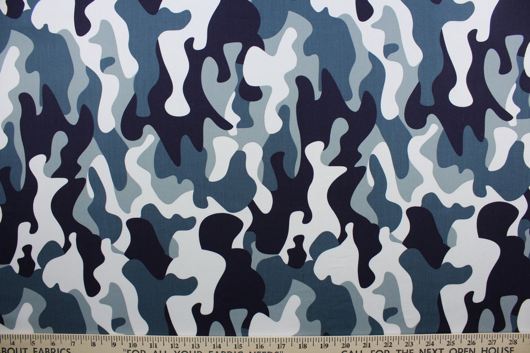Dappled Camo features camouflage patterning blended with shades of navy, white and blue/green. This pattern creates a unique camouflage that is both subtle and eye-catching.  The high-quality cotton material ensures lasting durability and softness.  It would be great for apparel, quilting, crafting and sewing projects.  