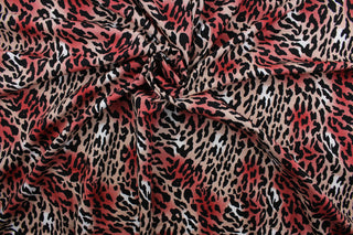 Make a bold statement with this Fiery Leopard in Rose print.  Featuring bold black and shades of vibrant red with subtle hints of white, this design is sure to turn heads.  Perfect for adding an edge to any look!  The high-quality cotton material ensures lasting durability and softness.  It would be great for apparel, quilting, crafting and sewing projects.  
