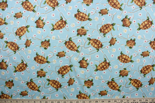  This "Terrapin Trail" design features cute turtles, colorful flowers, on a light blue background. The design is a perfect blend of warm shades of brown, green, white, red, and yellow that will bring a cheerful mood to your home.  The high-quality cotton material ensures lasting durability and softness.  It would be great for apparel, quilting, crafting and sewing projects.  