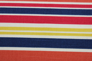 Robert Allen© Mod Layout in Fiesta is a multi-purpose fabric that features vivid, multicolored stripes in shades of red, orange, blue, yellow, and white.  The fabric is treated with a soil and stain repellant finish to ensure long lasting durability, with a rating of 30,000 double rubs.  It can be used for several different statement projects including window accents (drapery, curtains and swags), toss pillows, headboards, bed skirts, duvet covers and upholstery. 