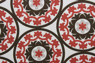 The Robert Allen© Suzani in Poppy is a multi-purpose fabric with a large medallion pattern featuring poppy, brown and putty shades against a white background. The fabric is soil and stain repellant, as well as 30,000 double rubs for durability.  Perfect for creating a stylish and timeless design.  It can be used for several different statement projects including window accents (drapery, curtains and swags), toss pillows, headboards, bed skirts, duvet covers and upholstery. 