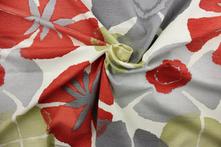 Printed on a medium weight cotton slub duck, this contemporary pattern features a large scale design in gray, natural, and coral on an ivory background. Perfect for modern décor, it adds a stylish touch to your living space.  The fabric is soil and stain repellant, as well as 30,000 double rubs for durability.  It can be used for several different statement projects including window accents (drapery, curtains and swags), toss pillows, headboards, bed skirts, duvet covers, upholstery, and more.