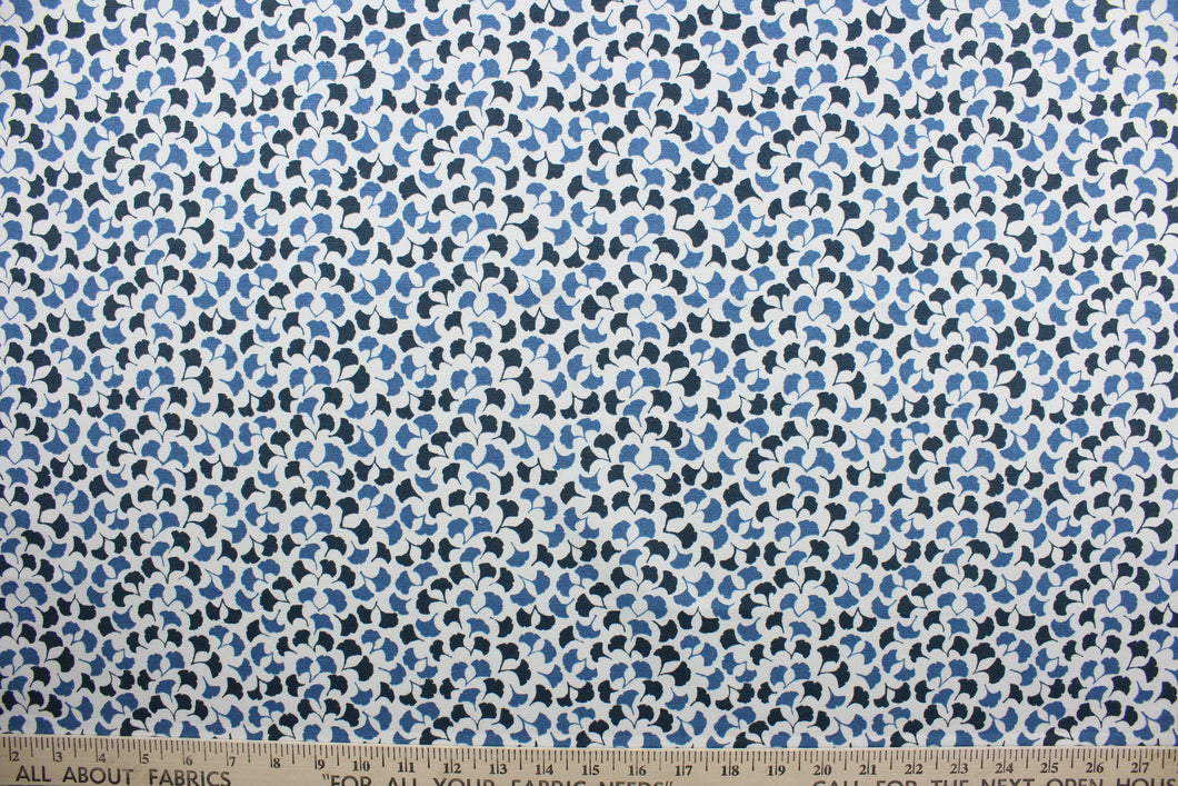  Featuring a small floral print with shades of blue against a white background, this material is sure to be a conversation starter.  Its 100,000 double rubs, plus soil and stain repellant finish, make it a practical and reliable choice for your next project.  It can be used for several different statement projects including window accents (drapery, curtains and swags), toss pillows, headboards, bed skirts, duvet covers, upholstery, and more.