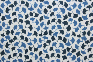  Featuring a small floral print with shades of blue against a white background, this material is sure to be a conversation starter.  Its 100,000 double rubs, plus soil and stain repellant finish, make it a practical and reliable choice for your next project.  It can be used for several different statement projects including window accents (drapery, curtains and swags), toss pillows, headboards, bed skirts, duvet covers, upholstery, and more.