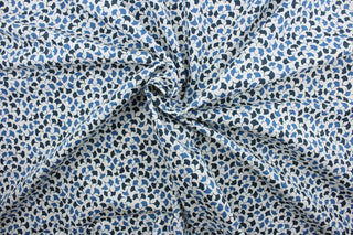  Featuring a small floral print with shades of blue against a white background, this material is sure to be a conversation starter.  Its 100,000 double rubs, plus soil and stain repellant finish, make it a practical and reliable choice for your next project.  It can be used for several different statement projects including window accents (drapery, curtains and swags), toss pillows, headboards, bed skirts, duvet covers, upholstery, and more.