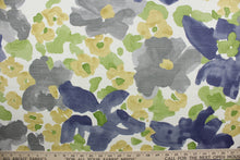 Load image into Gallery viewer, a beautiful multi-use fabric featuring a painterly watercolor floral print.  It features a distinguished blend of gray, green, gold, and blue against an off white background.  The fabric is soil and stain repellant, as well as 30,000 double rubs for durability.  It can be used for several different statement projects including window accents (drapery, curtains and swags), toss pillows, headboards, bed skirts, duvet covers, upholstery, and more.
