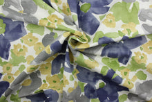Load image into Gallery viewer, a beautiful multi-use fabric featuring a painterly watercolor floral print.  It features a distinguished blend of gray, green, gold, and blue against an off white background.  The fabric is soil and stain repellant, as well as 30,000 double rubs for durability.  It can be used for several different statement projects including window accents (drapery, curtains and swags), toss pillows, headboards, bed skirts, duvet covers, upholstery, and more.
