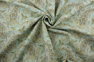 The Robert Allen© Paisley in Dew fabric is a classic paisley design with stylish colors - aqua, teal, gold, and gray. This multi-use fabric has a durable crypton finish, making it resistant to stains, moisture and odors, and with a 30,000 double rubs rating for long-lasting quality.  It can be used for several different statement projects including window accents (drapery, curtains and swags), toss pillows, headboards, bed skirts, duvet covers and upholstery. 