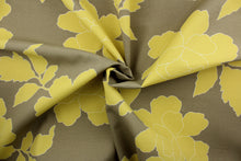 Load image into Gallery viewer, This Robert Allen© New Peony in Canary Taupe is a multi-use fabric that features large peony flowers in canary yellow and white against a dark taupe background. The fabric is finished with a soil and stain repellant treatment, making it a durable and long-lasting choice.  It can be used for several different statement projects including window accents (drapery, curtains and swags), toss pillows, headboards, bed skirts, duvet covers and upholstery. 
