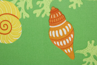  Beach Bongo in Citrus is an outdoor fabric with an eye-catching design of brightly colored seashells and coral against a lime green background.  Perfect for outdoors, the fabric is water and mildew resistant and rated to 105,000 double rubs, making it durable enough to stand up to the elements.  With hints of yellow, orange, and white, it complements any outdoor décor.  Great for upholstery, cushions, pillows, and tote bags.