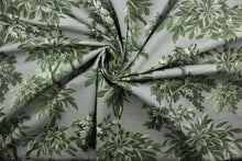 Load image into Gallery viewer, Robert Allen© Sylvan Toile features a beautiful botanical print on a traditional gray background. The vibrant colors of green, black, and white will bring a timeless charm to any room. Treated with a soil and stain repellant finish, this fabric is durable with a 30,000 double rub rating.  It can be used for several different statement projects including window accents (drapery, curtains and swags), toss pillows, headboards, bed skirts, duvet covers, upholstery, and more.
