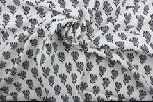 Load image into Gallery viewer, The Robert Allen© Lighten Up in Ebony is a multi-purpose linen fabric featuring an elegant ebony floral design against a crisp white background.  It can be used for several different statement projects including window accents (drapery, curtains and swags), toss pillows, bed skirts, home décor and more.
