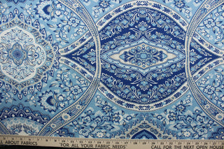 This multi-purpose fabric features a vibrant floral damask print with a mix of blue, tan, and white colors. Crafted with a soil and stain repellent finish, it's perfect for anything from drapery to upholstery.  It can be used for several different statement projects including window accents (drapery, curtains and swags), toss pillows, headboards, bed skirts, duvet covers, upholstery, and more.