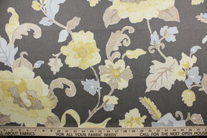 This multipurpose fabric features a combination of soft yellow, taupe, blue, and gray colors, allowing for an array of design possibilities.  Treated with a soil and stain repellant finish, this fabric is durable with a 30,000 double rub rating.  It can be used for several different statement projects including window accents (drapery, curtains and swags), toss pillows, headboards, bed skirts, duvet covers, upholstery, and more.