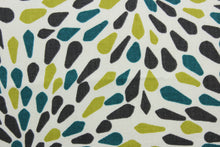 Load image into Gallery viewer, The &quot;Many Petals in Turquoise&quot; pattern is perfect for a transitional look, containing shades of turquoise, green, dark brown and off white. With a soil and stain repellant finish and a 100,000 double rubs rating, it&#39;s both stylish and durable.  It can be used for several different statement projects including window accents (drapery, curtains and swags), toss pillows, headboards, bed skirts, duvet covers, upholstery, and more.
